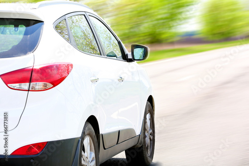 Very fast driving car on road