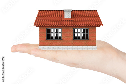 Real Estate Concept. House model in the hand