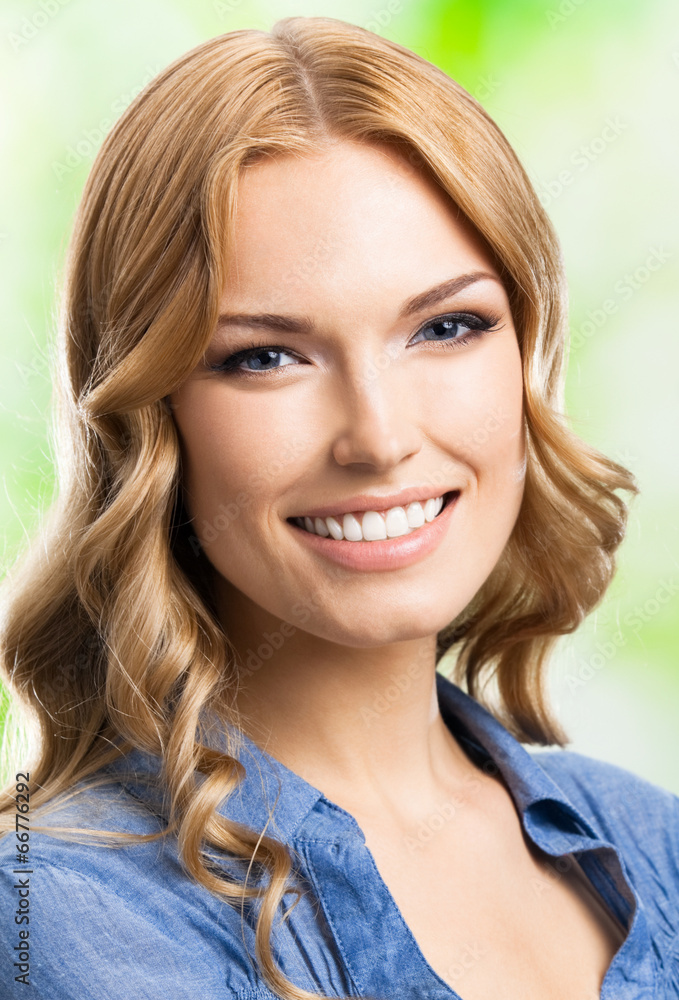 Happy smiling woman with long hair, outdoor Happy smiling woman with long hair, outdoor
