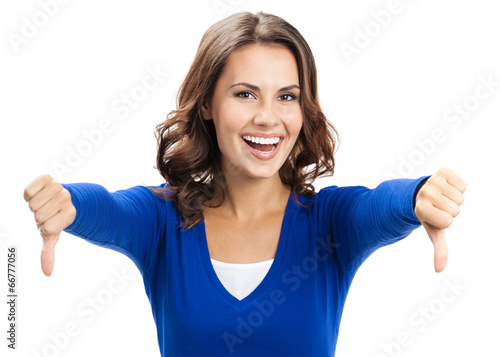Woman showing thumbs down gesture, isolated photo