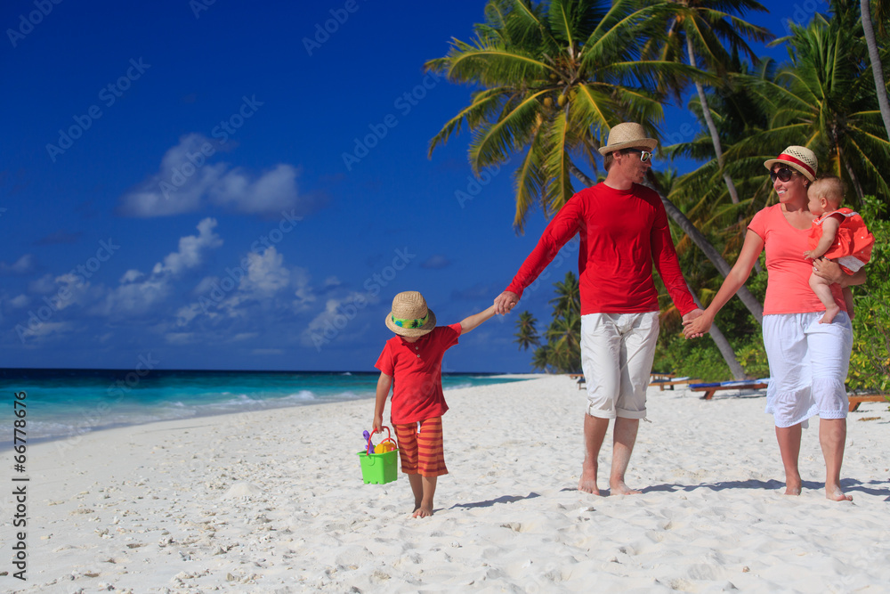 family with kids on tropical beach