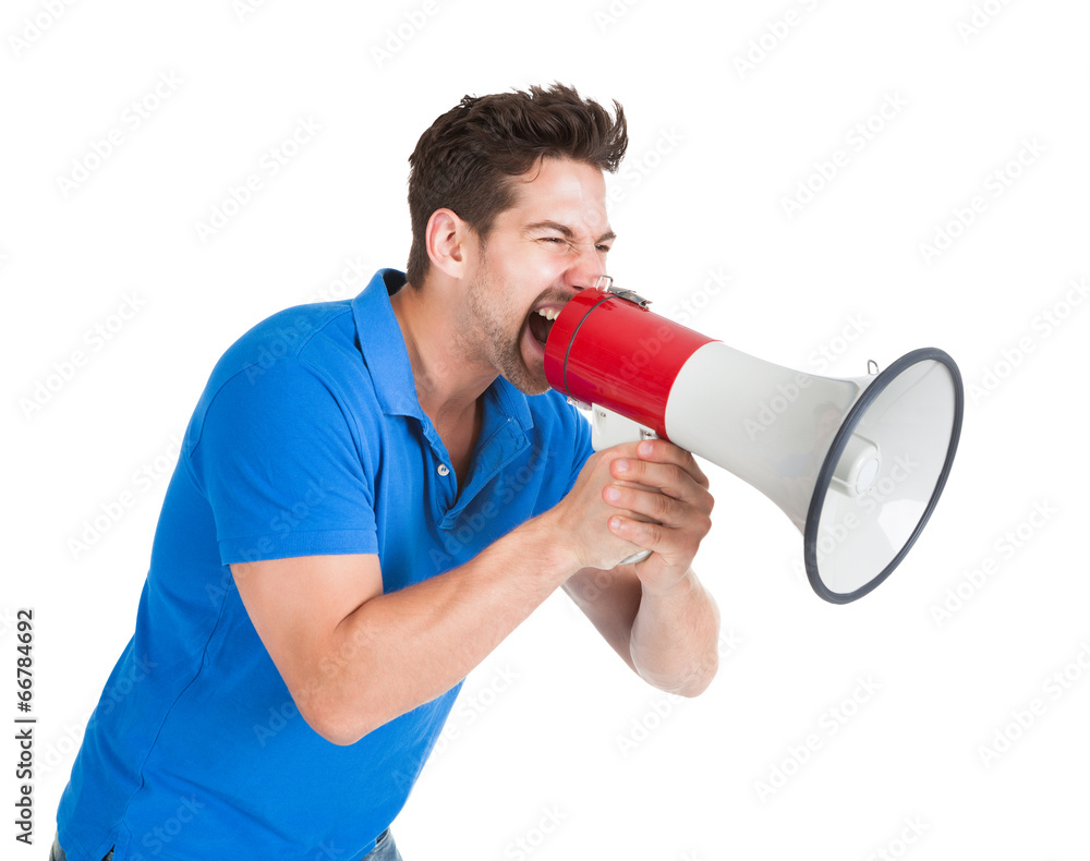Man Screaming Into Bullhorn While Pointing Away Man Screaming Into Bullhorn While Pointing Away