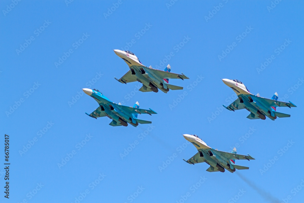 Four Su-27 in the blue sky - obrazy, fototapety, plakaty 