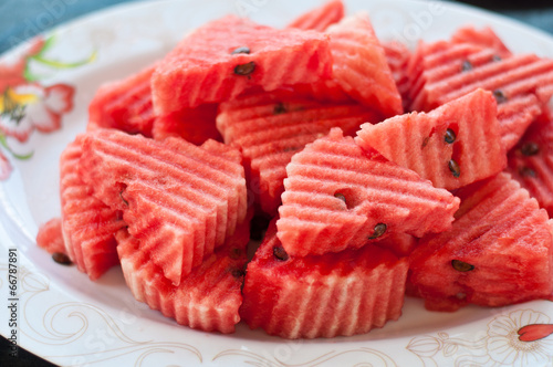 Fresh slices of red watermelon on the plate