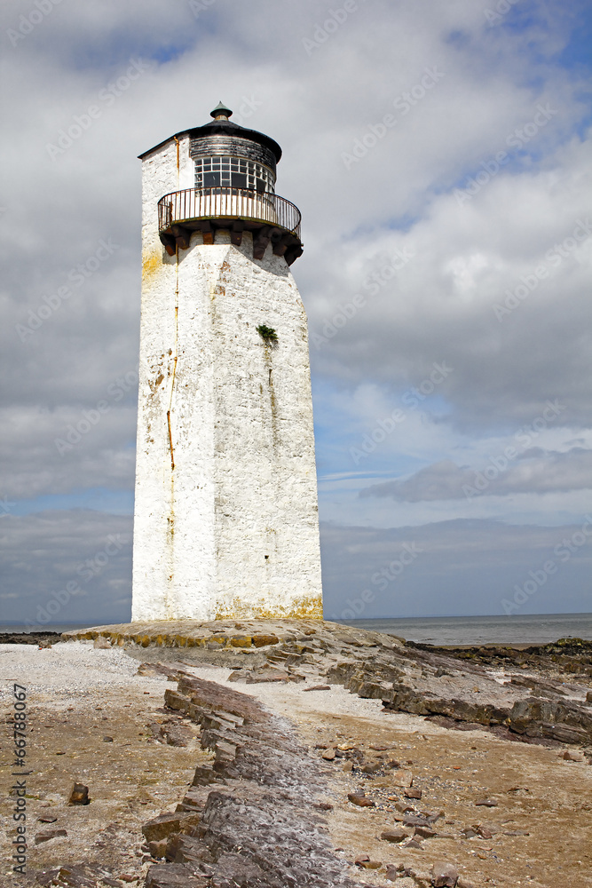 Southerness Lighthouse and Rock Formation Portrait Close Up