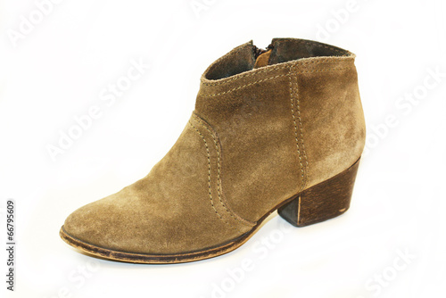 Woman short brown boots isolated on white background