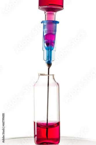 Syringe with medicine red, vitamin B