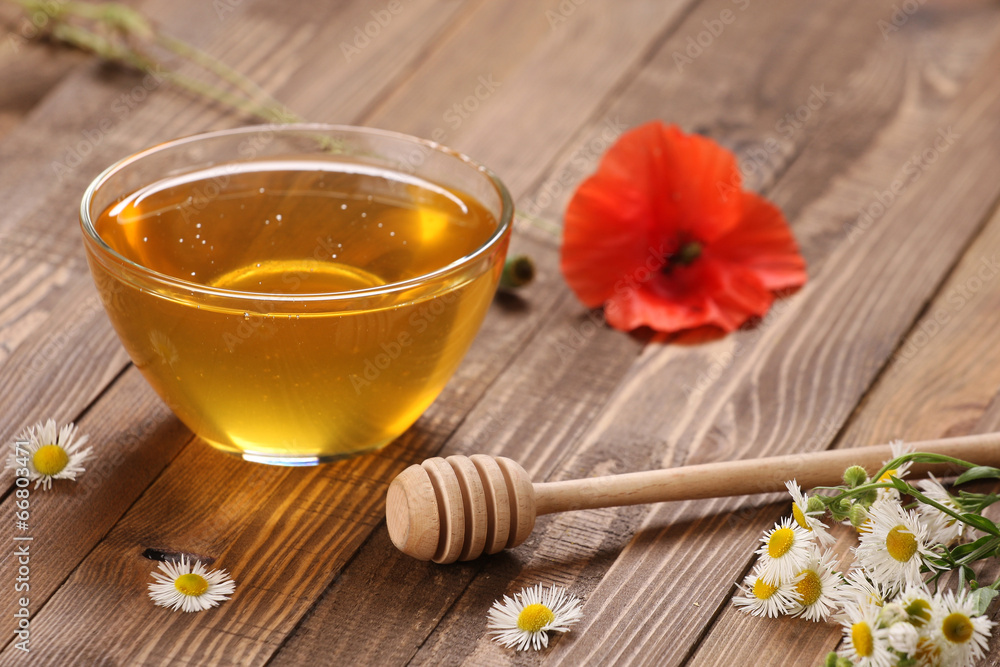 honey in a glass bowl honey in a glass bowl