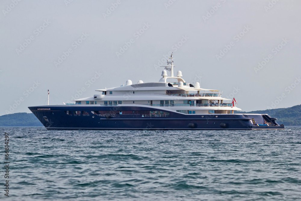 Megayacht floating on open sea Megayacht floating on open sea