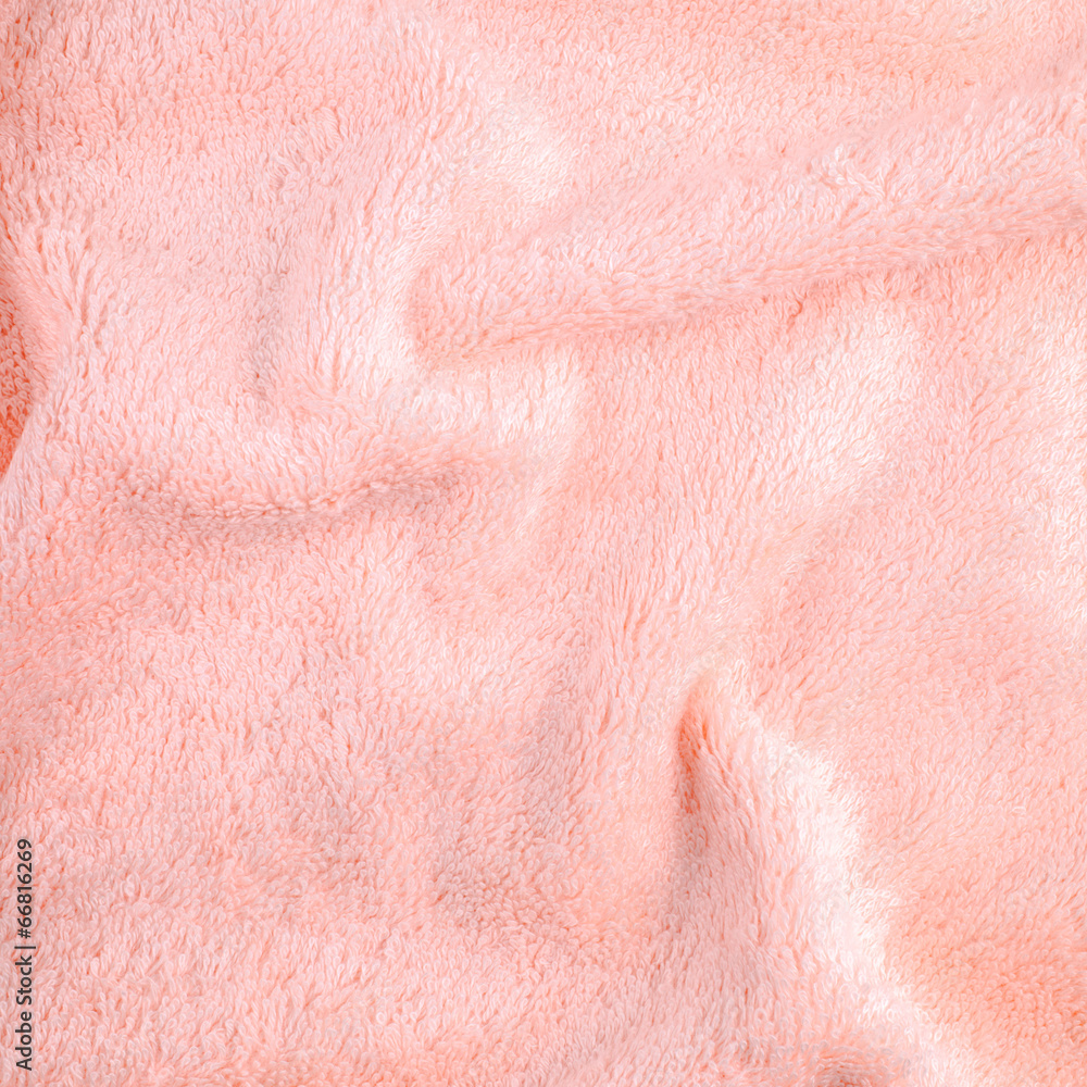 pink texture of bath towel folded as a background pink texture of bath towel folded as a background