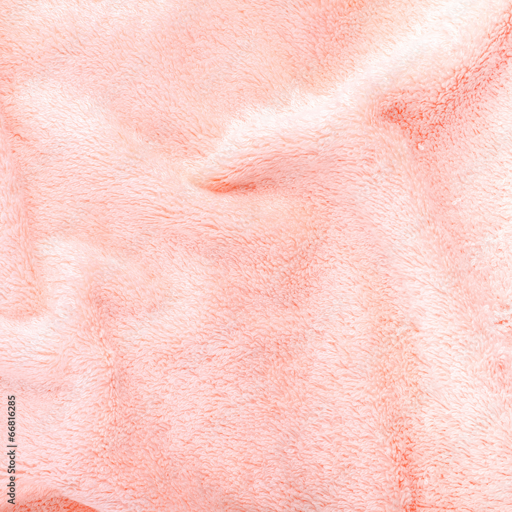 Fototapeta premium pink texture of bath towel folded as a background