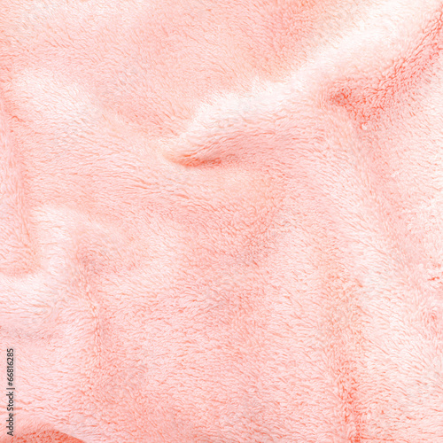 pink texture of bath towel folded as a background