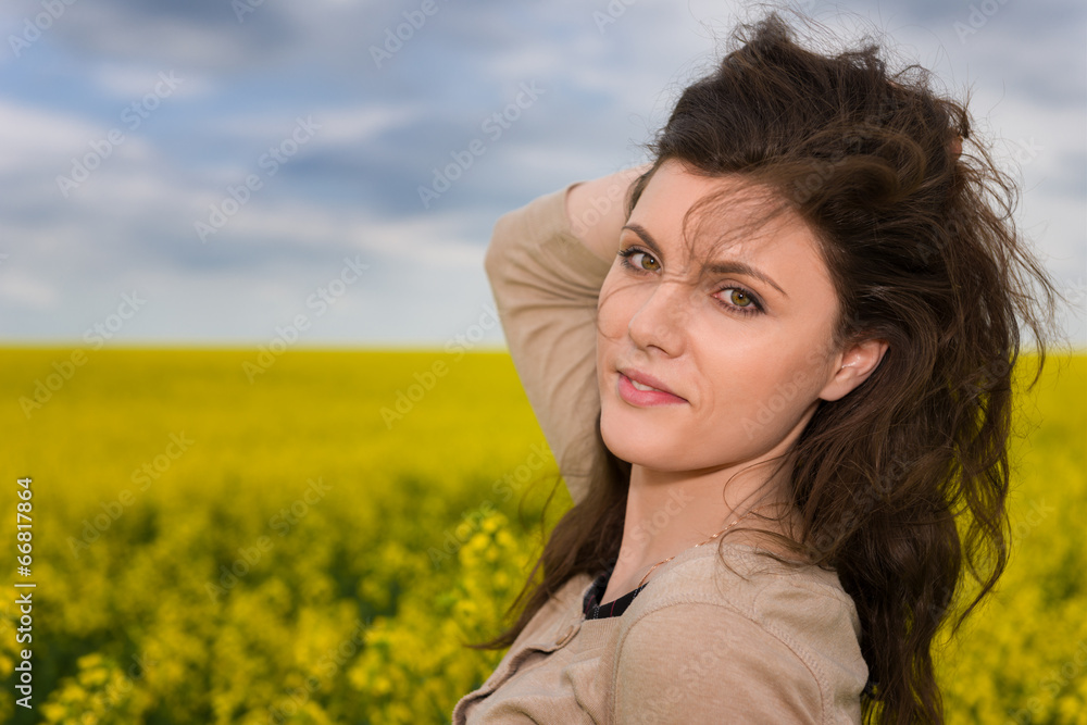 woman portrait in yellow flower field woman portrait in yellow flower field