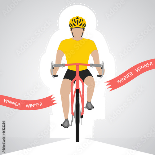 yellow dressed cyclist in front view crossing red finish line 