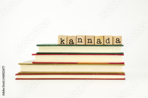 kannada language word on wood stamps and books