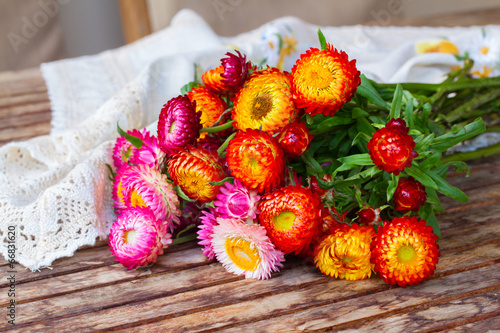 Fototapeta Naklejka Na Ścianę i Meble -  Bouquet of Everlasting flowers on table