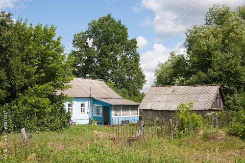 Russian village house and barn