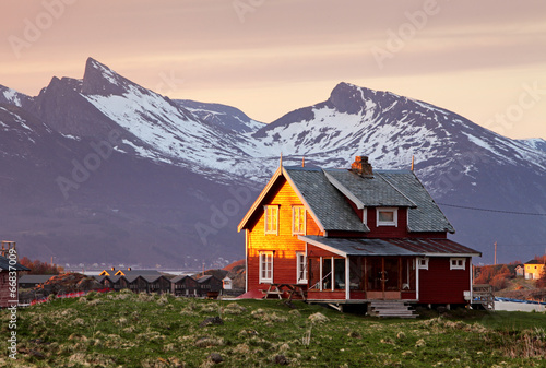 Norway house with mountain in background photo