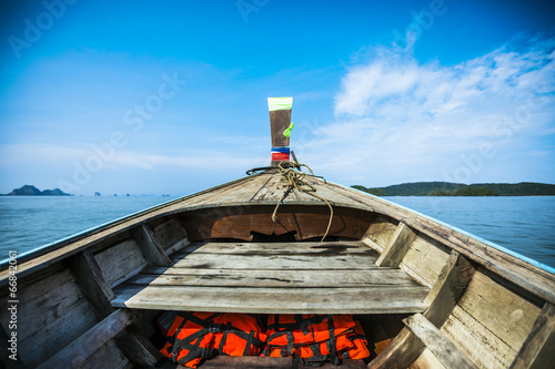 The bow of a boat into the sea