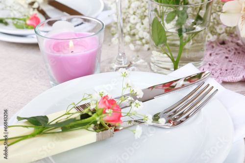 Table setting with spring flowers close up