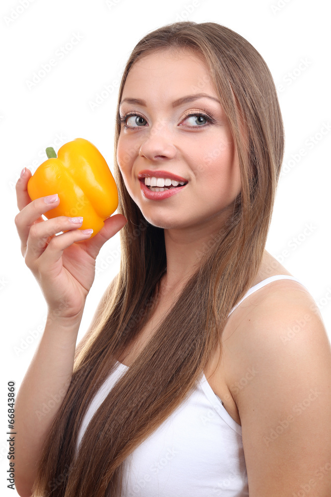 Beautiful girl with yellow pepper, isolated on white Beautiful girl with yellow pepper, isolated on white