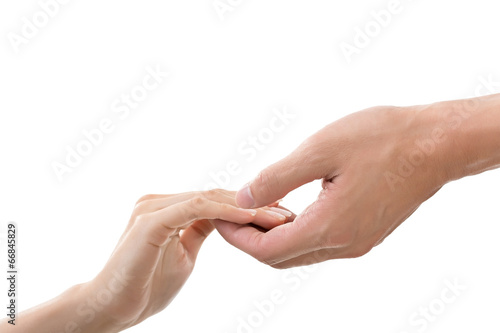Man and woman holding hands photo