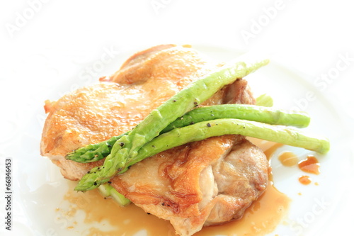 Teriyaki chicken and grilled asparagus photo