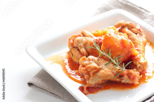 Mediterranean food, simmered chicken and tomato