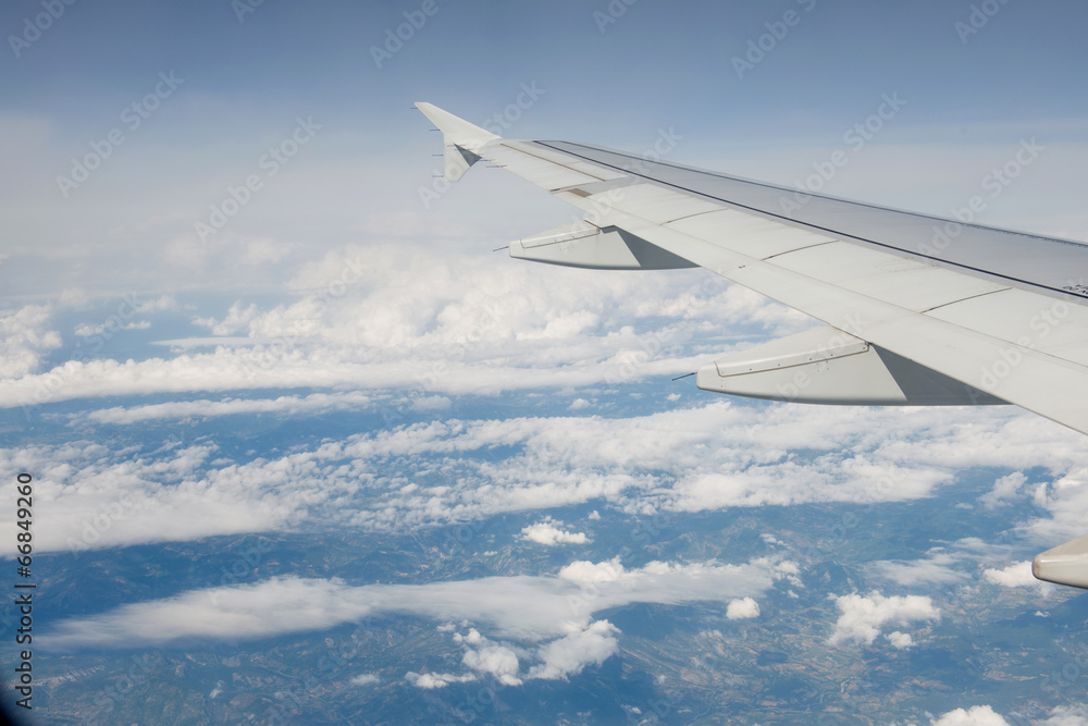 Airplane wing out of window Airplane wing out of window