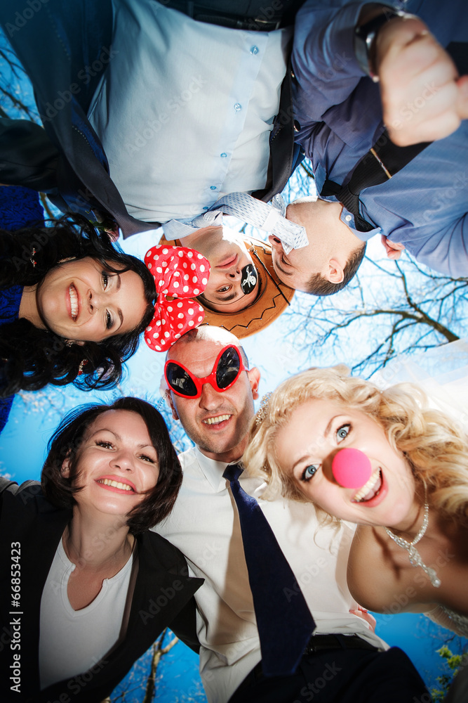 Fototapeta premium Group of happy young people in circle