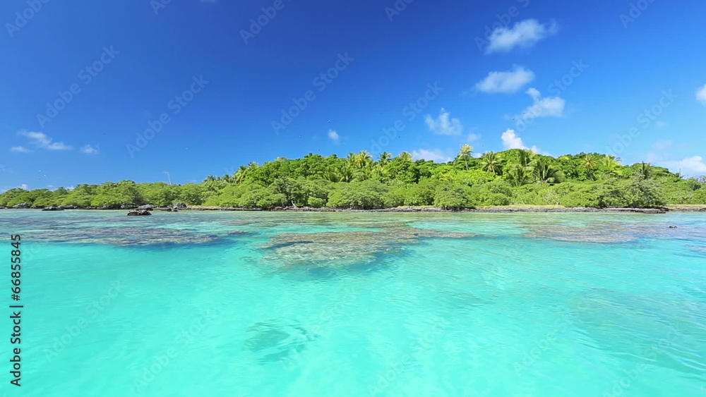 tropical island and blue ocean with coral reef tropical island and blue ocean with coral reef
