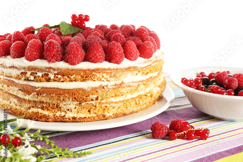 Tasty cake with fresh berries, isolated on white