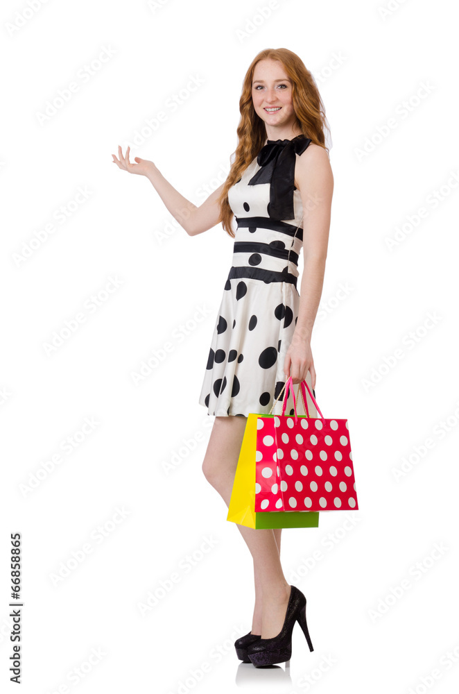 Young woman with shopping bags on white Young woman with shopping bags on white