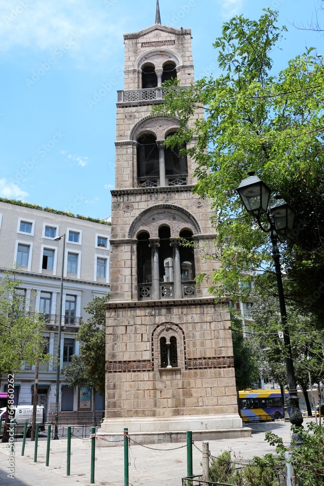 The bell tower in front of the church Sotira Lykodimou