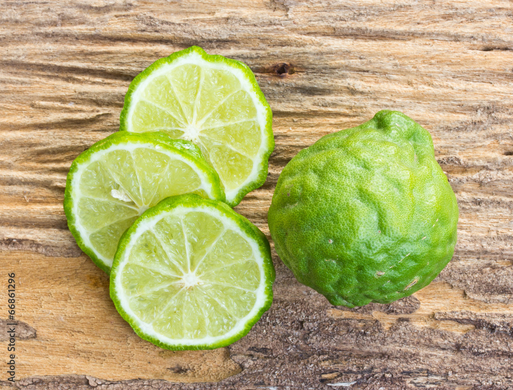 kaffir limes on old wood