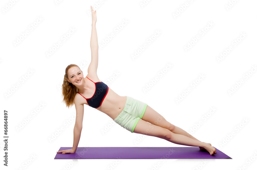 Young woman doing sport exercises isolated on white Young woman doing sport exercises isolated on white