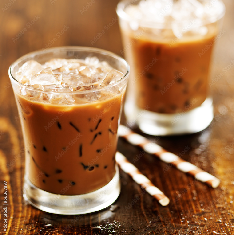 two glasses of iced coffee shot with selective foc us two glasses of iced coffee shot with selective foc us