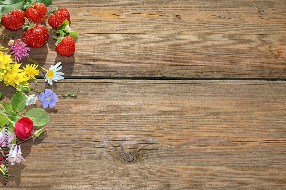 Summer Flowers and Berries on Grunge Wood Board Summer Flowers and Berries on Grunge Wood Board