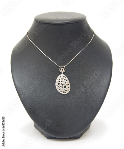 beautiful silver necklace on mannequin isolated on white