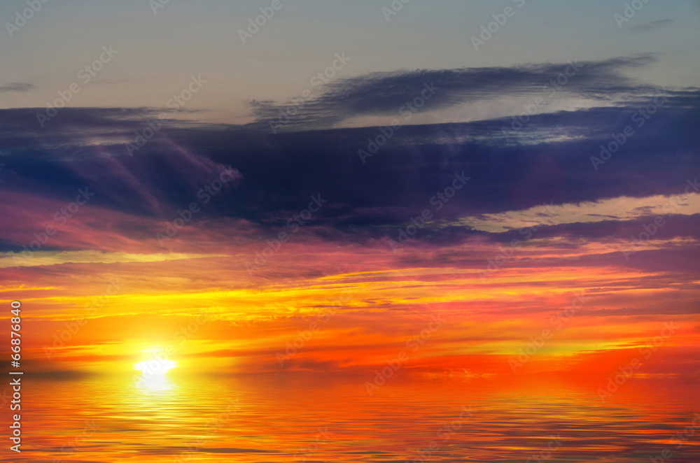 Fototapeta premium Sunset-fire against the sea. Natural composition
