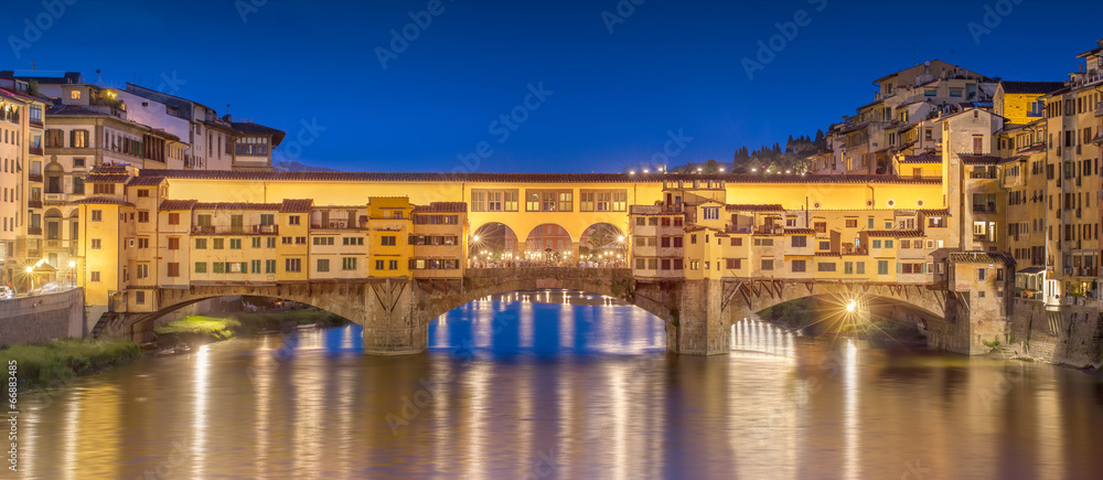 Night panoramic view of Vecchio Bridge, Florence