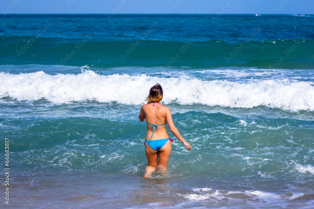 Women stand in the sea on Koh Phangan Thailand Women stand in the sea on Koh Phangan Thailand