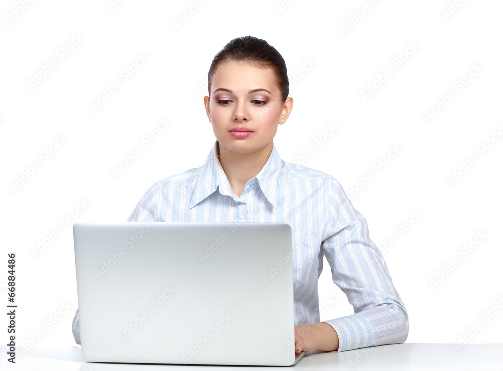 young woman sitting with a laptop, isolated on white background young woman sitting with a laptop, isolated on white background