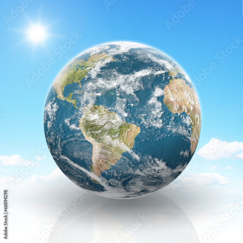 Planet Earth on a cloudy background