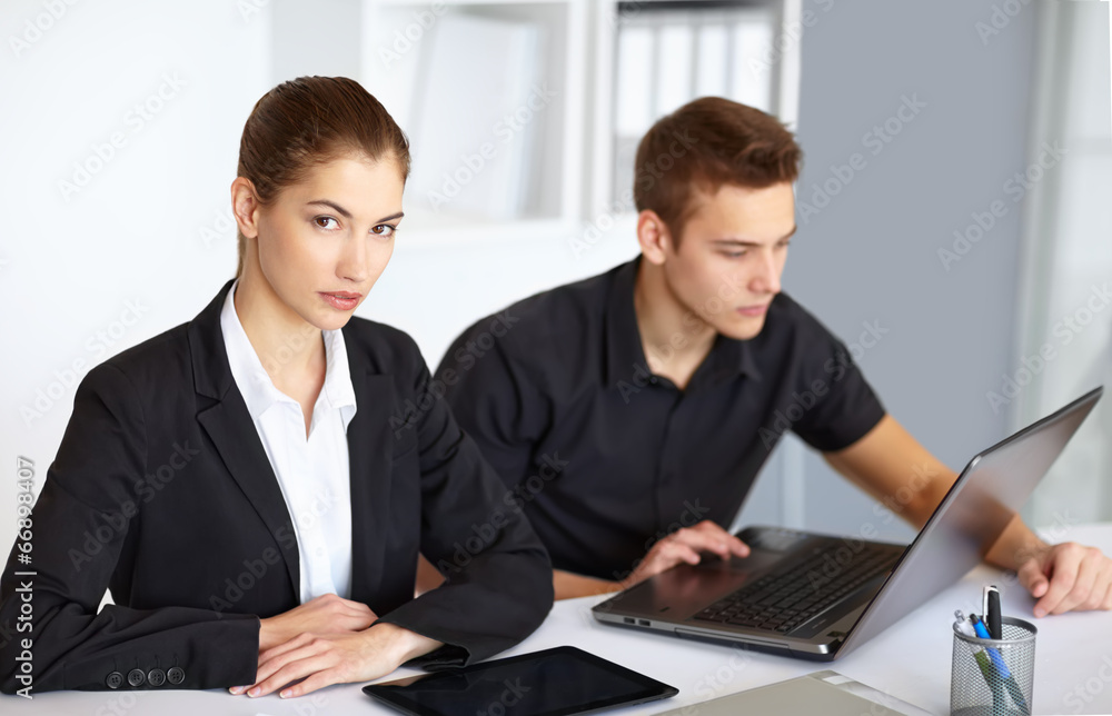 Businesspeople working in office