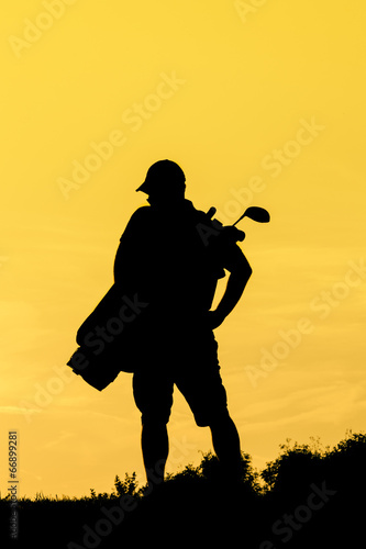 Golfer at sunset