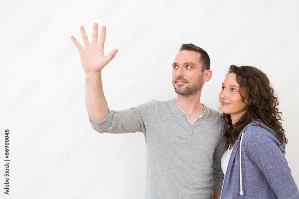 Couple using imaginary touchscreen interface Couple using imaginary touchscreen interface
