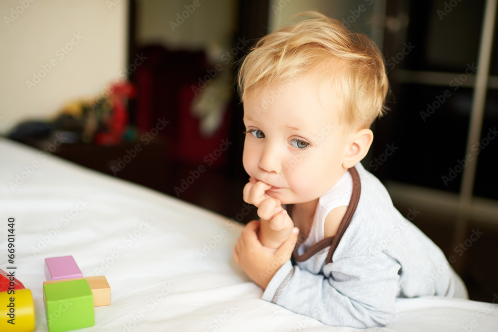 Cute little boy playing with blocks. Cute little boy playing with blocks.