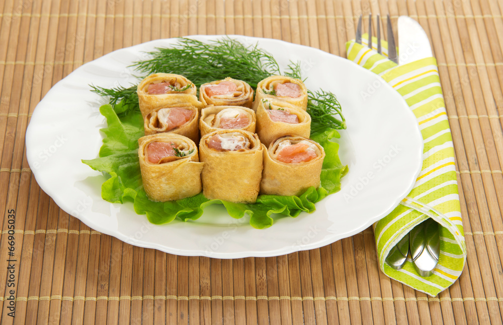 Flapjack with salmon and salad, cutlery Flapjack with salmon and salad, cutlery