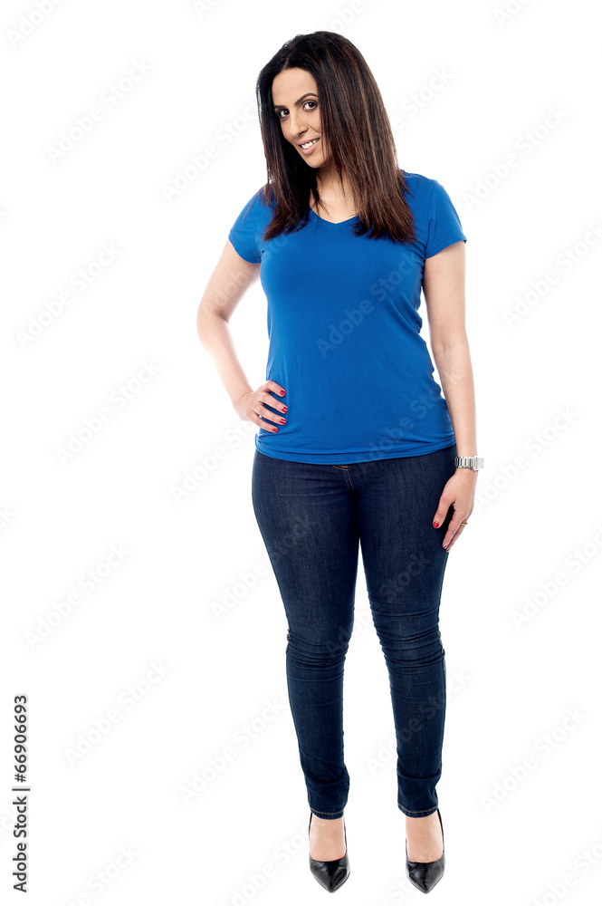 Casual young woman standing isolated on white Casual young woman standing isolated on white